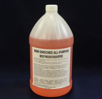 gallon jug, orange liquid, white label